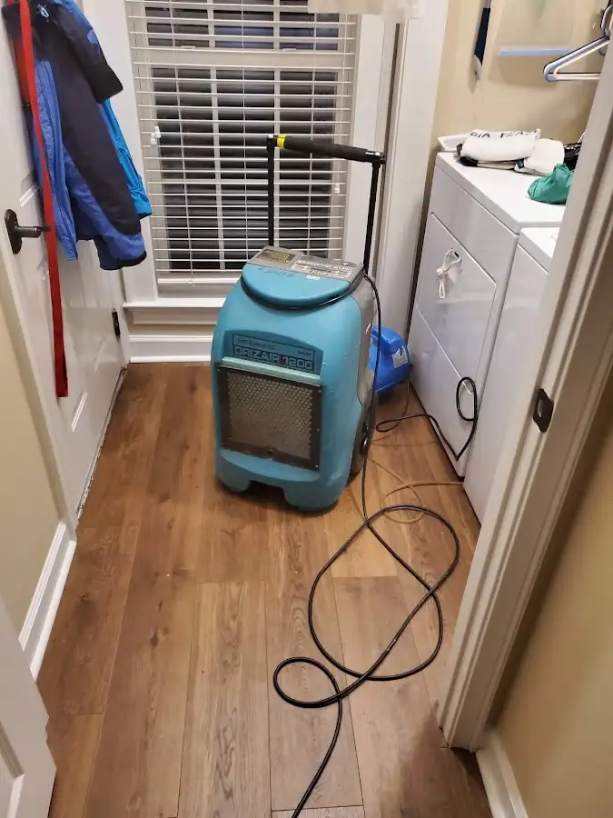 Commercial dehumidifier deployed for Flood Damage Cleanup in Holiday